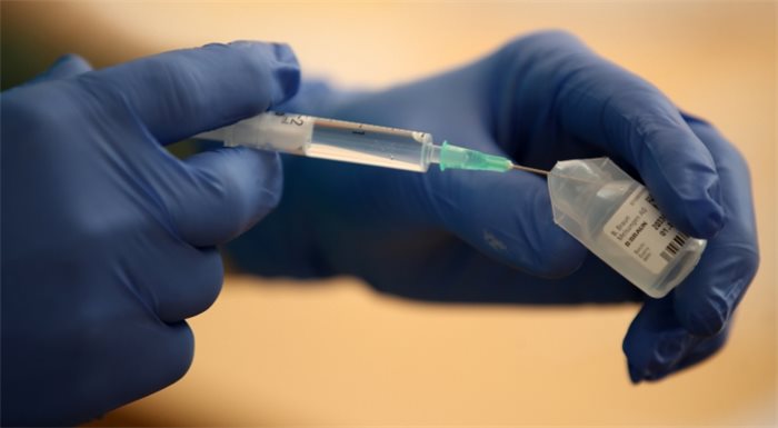 First Minister defends vaccine rollout