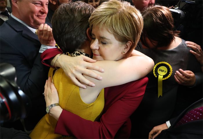 Hug life: cuddle ban over as First Minister says 'you can hug your loved ones again'