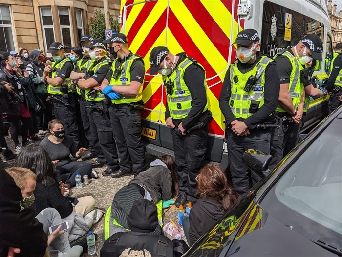 Hundreds protest Home Office immigration raid in Glasgow