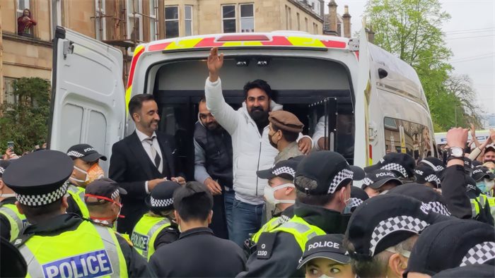 Detained men released from immigration van after mass protest in Glasgow
