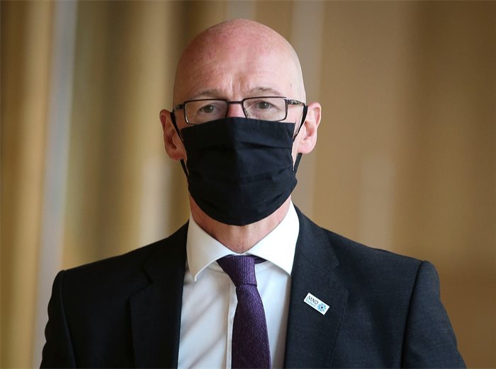 John Swinney apologises for sharing COVID face mask graphic
