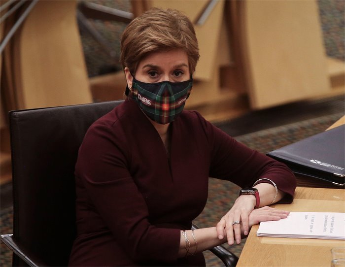 Nicola Sturgeon suggests learning to live with Covid could mean face coverings for long term