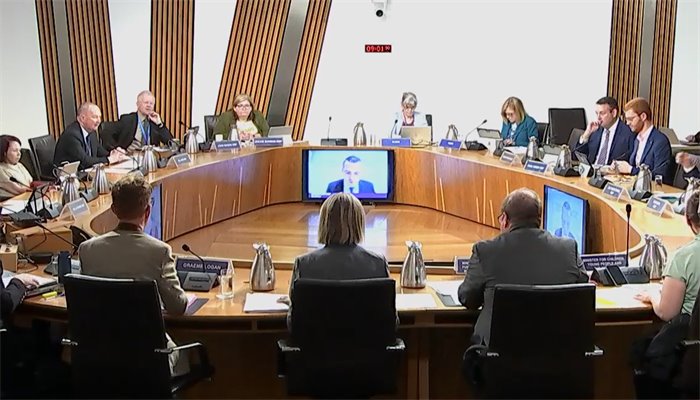Douglas Ross refuses to leave committee after dialling in from the Caribbean