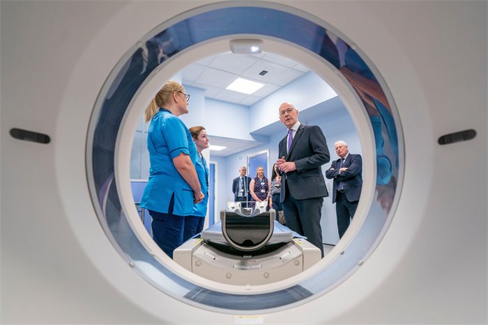 John Swinney defends government record on cancer waits
