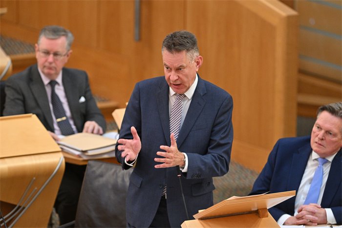First minister accused of lacking credibility over digital ID cards