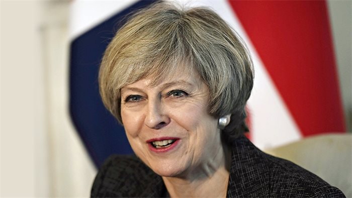 Theresa May criticises Donald Trump Paris climate agreement withdrawal