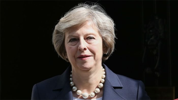 Theresa May announces legislation to cap energy bills