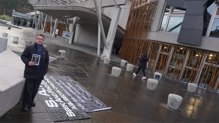 Child abuse survivor in vigil outside parliament while Kezia Dugdale remains in jungle