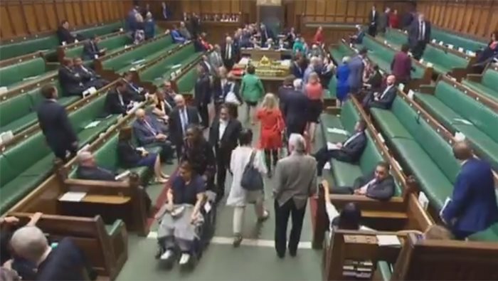 Theresa May survives Brexit showdown as sick MPs attend to vote