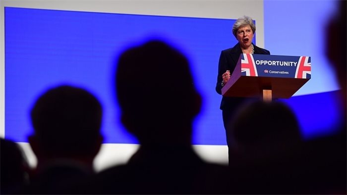 Theresa May declares austerity 'over' in conference speech