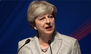 Online abuse is deterring women from entering politics, Theresa May warns